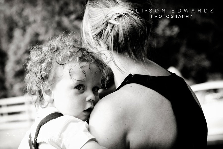 boy and mum at st. james church papplewick Nottingham captured by Nottingham wedding photographer Alison Edwards