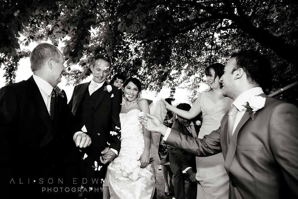 classic wedding photos of bride and groom with confetti