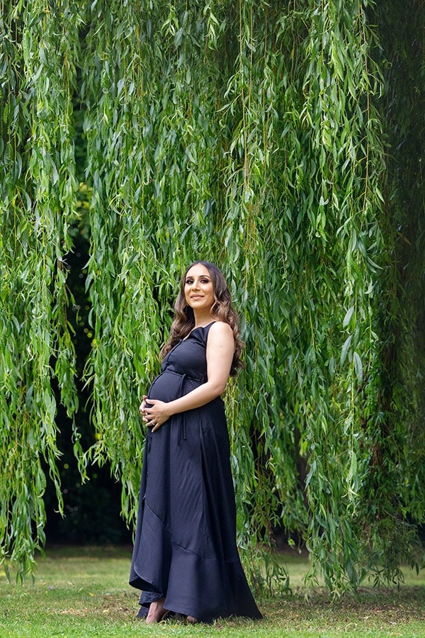 pregnancy women wearing long black dress