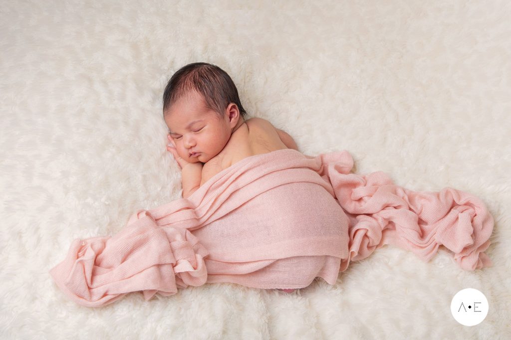 best age to photograph a newborn baby girl sleeping