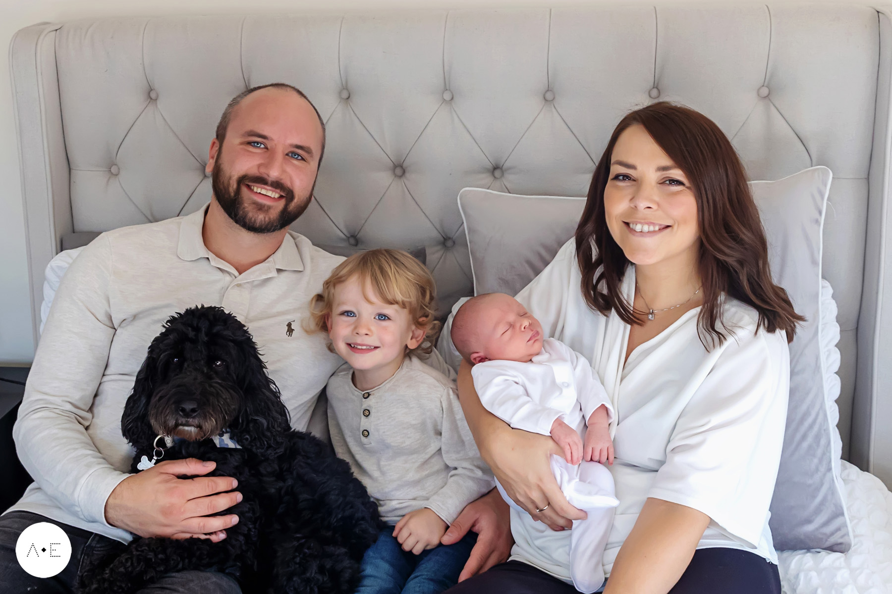 newborn pictures with parents of baby boy, brother and dog