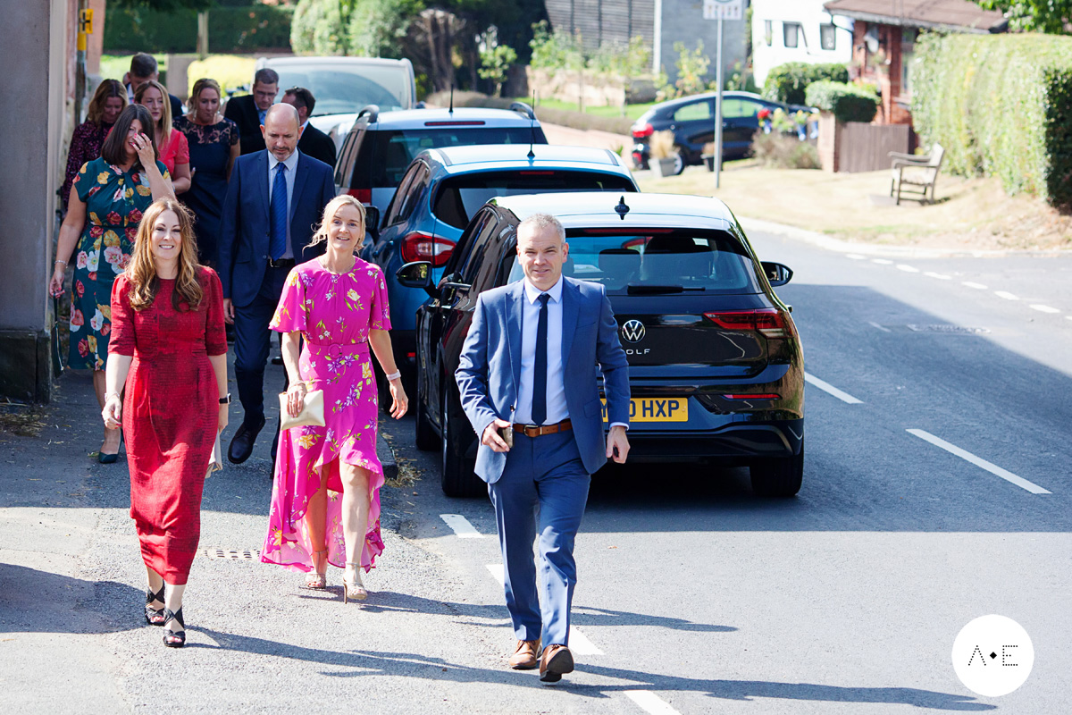 wedding guests walking to St Mary's Plumtree Nottingham
