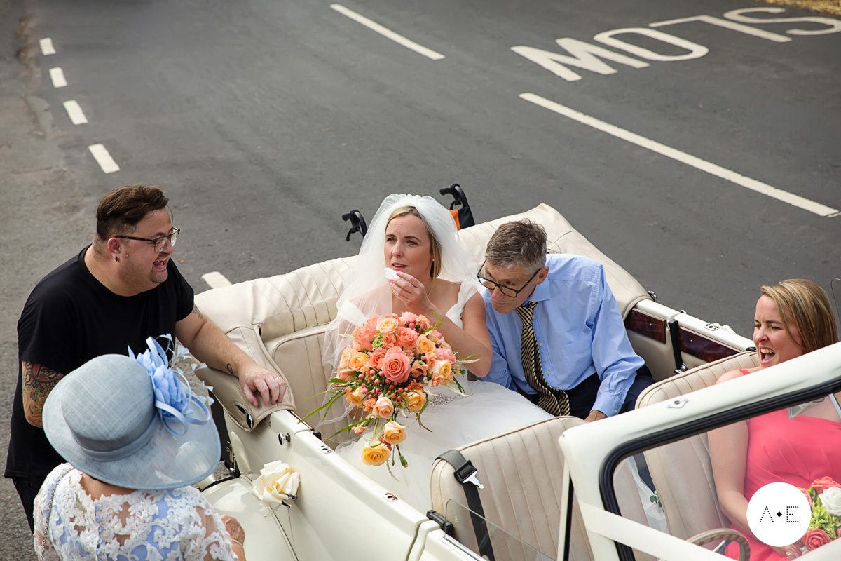 bride dad and guests in wedding car at Plumtree church