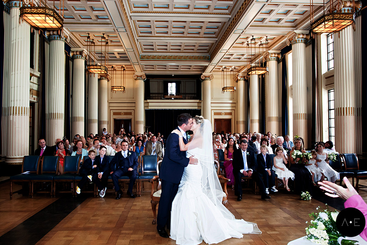 bride and groom kissing at nottingham council offices