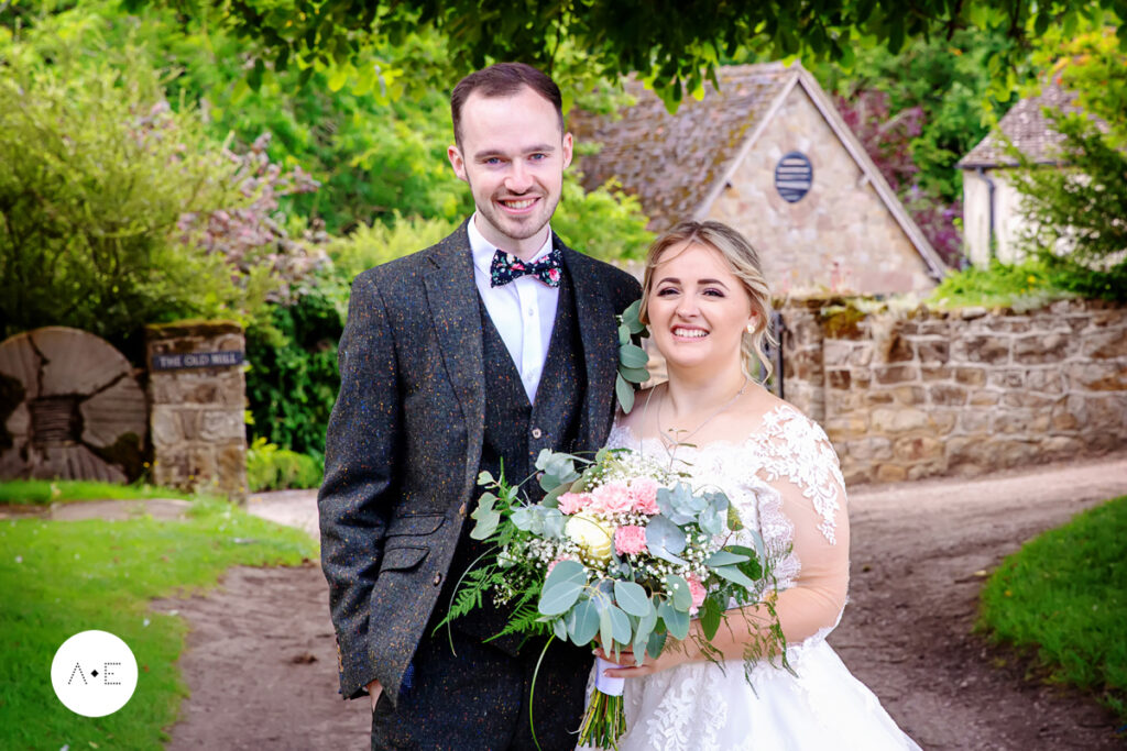 bride and groom at Melbourne Lake Derbyshire captured by Amalfi White wedding photographer