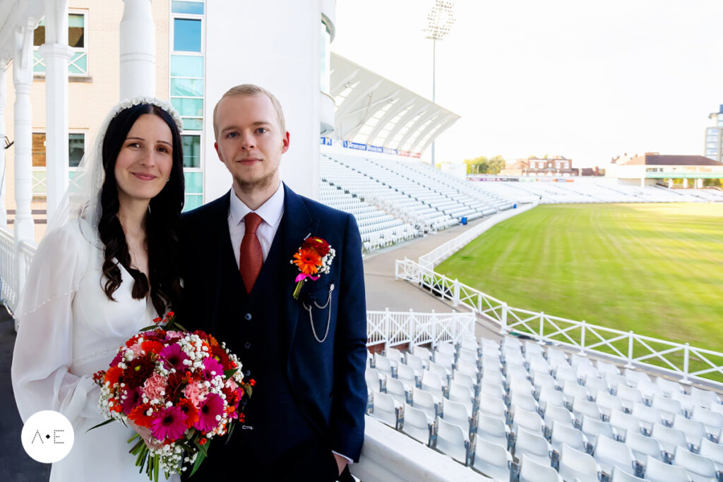 Trent bridge cricket ground wedding photography bride and groom portrait on balcony captured by Alison Edwards Photography