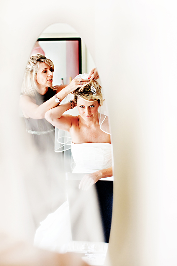 bride's reflection in mirror captured by cotswold last minute wedding photographer Alison Edwards