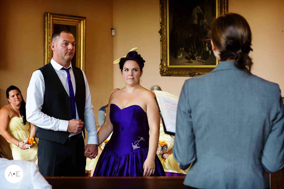 bride and groom exchanging vows captured by Alison Edwards Photography Nottingham wedding photographer