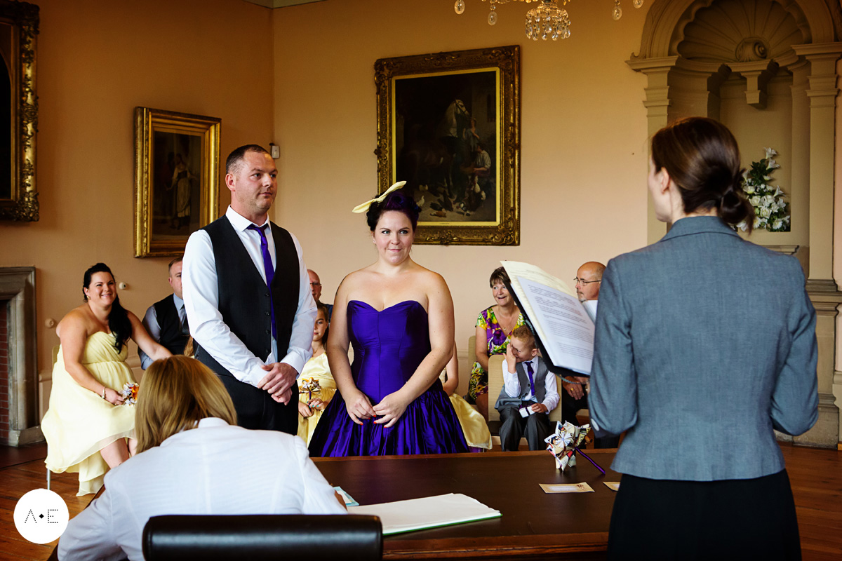 bride and groom exchanging vows captured by Alison Edwards Photography Nottingham wedding photographer