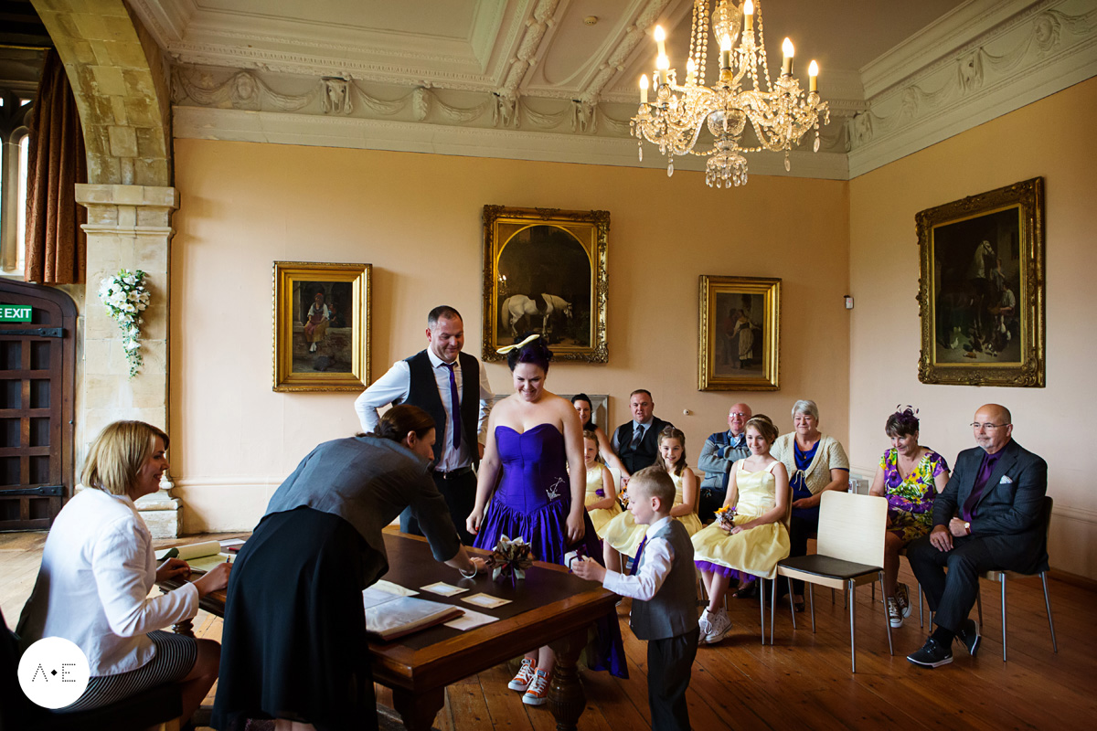 bride and groom exchanging vows captured by Alison Edwards Photography Nottingham wedding photographer