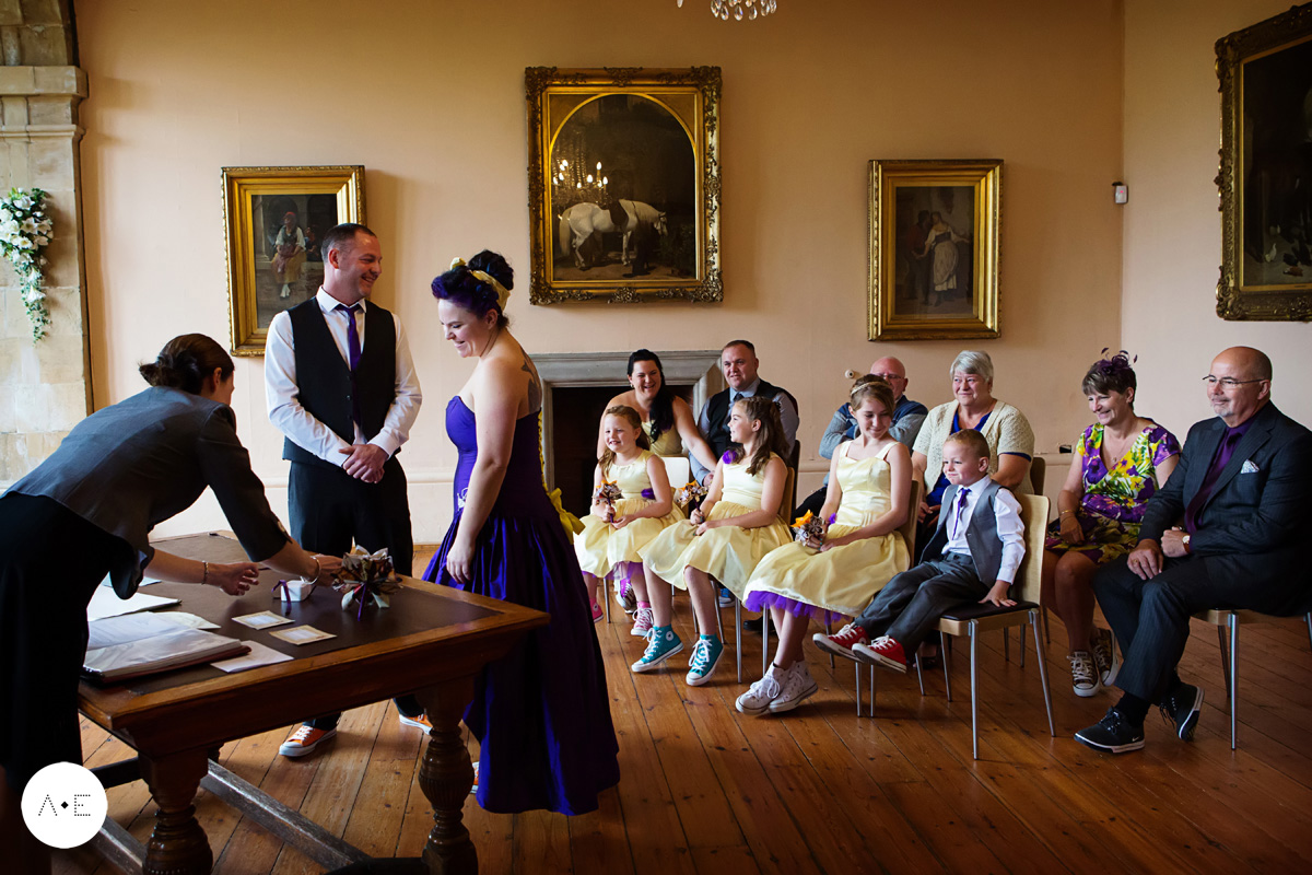 bride and groom exchanging vows captured by Alison Edwards Photography Nottingham wedding photographer