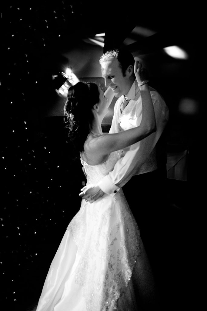 bride and groom's first dance captured by Alison Edwards on her twilight wedding photography collection