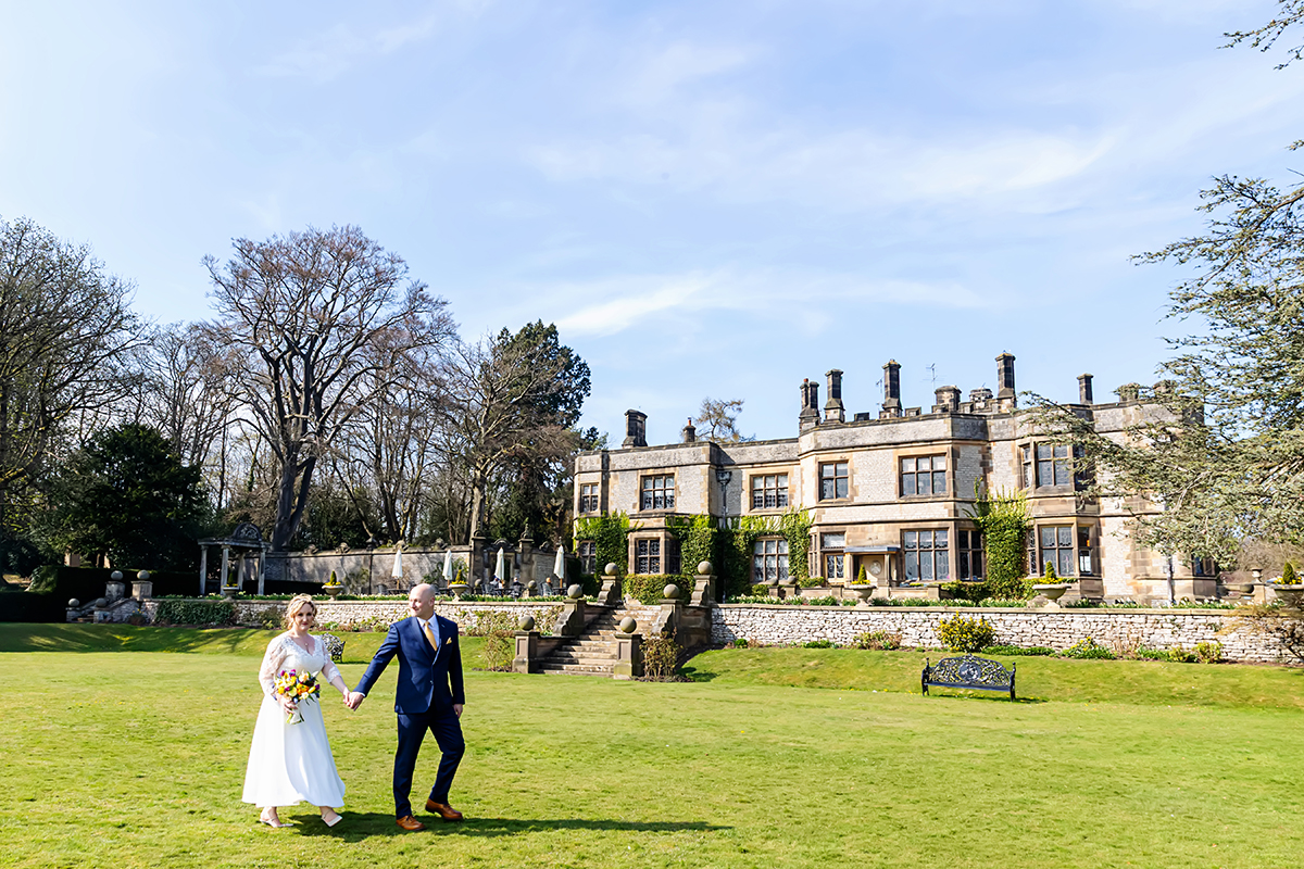 bride and groom at Thornbridge Hall Estate captured by twilight wedding photographer Alison Edwards Photography