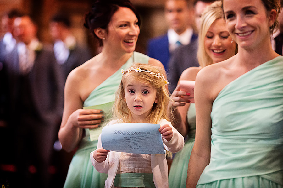 young girl singing in church photographed by Chesterfield wedding photographer Alison Edwards Photography